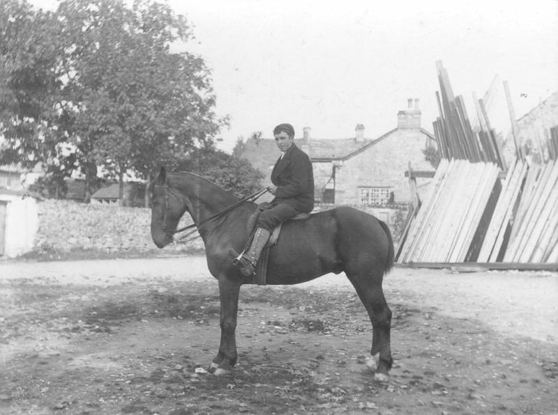Man on horseback.jpg - Back Green - Long Preston - J. Beecroft's joiners shop with timber seasoning racks.    ( Date & person unknown )  